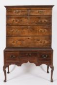 An 18th Century oak chest on stand:, the