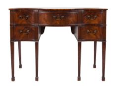 A George III mahogany serpentine fronted
