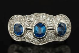 A platinum, sapphire and diamond mounted