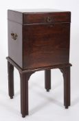 A George III mahogany square cellarette: