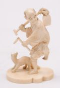 A Japanese carved ivory okimono: of a pe