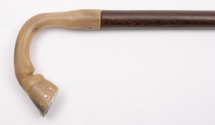 An Edwardian hardwood and horn gentleman