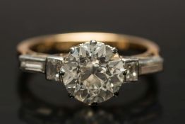 A diamond single-stone ring: with round