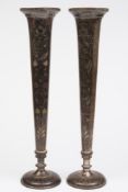 A pair of Indo-Persian white metal, enam