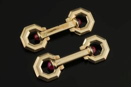 A pair of cabochon ruby coloured gem-set