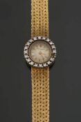 Baume & Mercier. A lady's 14ct gold wris