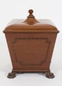 A carved mahogany square coal box and co