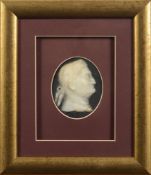 A black and white stone cameo plaque of