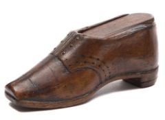 A 19th century treen snuff box in the fo