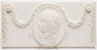 A carved marble plaque: the oval chartoc