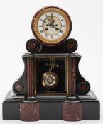 A Victorian French black marble mantel c