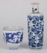 A Chinese blue and white cup and a small