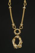 An 18ct gold and diamond mounted necklac