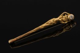 An Art Nouveau-style gold and diamond pi