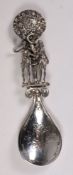A Continental silver preserve spoon, bea