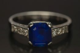A platinum and sapphire single-stone rin