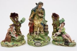 A pair of Staffordshire earthenware spil