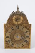An 18th century brass lantern clock with