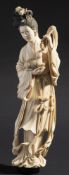A Japanese carved ivory okimono: of a wo