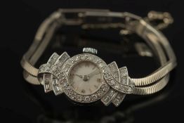 A lady's diamond mounted cocktail wristw