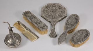A Persian silver dressing table set: wit