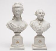 A pair of biscuit porcelain busts of Mar