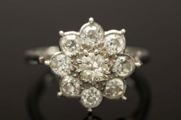 A diamond mounted cluster ring: mille-gr