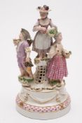 A  Meissen outside decorated figure grou