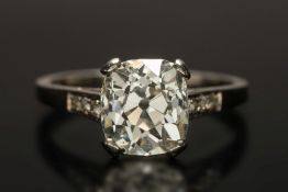 A diamond single-stone ring: with cushio