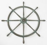 A bronze ship's auxiliary helm:, of typical eight spoke design, 78cm diameter.