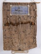 A ropework and canvas display panel from the Steam Salvage Tug 'Superman':,