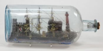 A late 19th century 'ship in a bottle' of the armored schooner HMS Lion:,