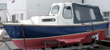 A 20ft motor launch 'Wier Dolphin' of Dartmouth:, forward cabin and canopy to cockpit,