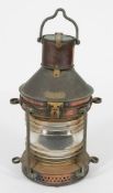 A ship's copper and brass anchor signal lamp by William McGeoch and Co Ltd, Glasgow,