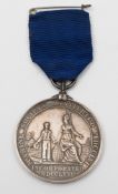 Marine Society reward for Merit medal:, obverse with Britannia holding the hand of a young man,