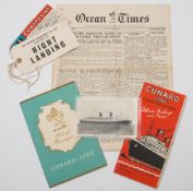 A collection of ephemera from the Cunard liner RMS Queen Elizabeth:, including  passenger list,