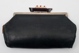 A lady's black leather Ocean liner themed evening bag for Bentalls of London: the three colour