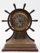 An Edwardian gilt ship's helm mantel clock presented as a gift by The Earl of Jellicoe to Dr P H