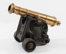 An 18th century bronze signal cannon:, the five stage barrel with copper wrapped trunions,