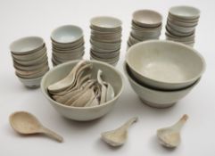 Tek Sing Cargo - fifty small tea bowls, three large bowls and fifteen spoons: under ivory glazes.