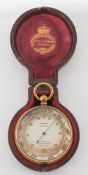 A gilt pocket barometer Callaghan & Co, London: the silvered dial signed Callaghan & Co,