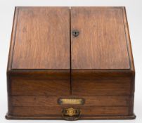 Of Devonport interest- A Victorian oak stationary cabinet presented to Rev C R Teupe,