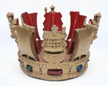 An Admiralty pattern cast aluminium crown:, painted in colours on a gold ground, 18cm high,