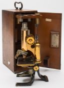 A lacquered brass microscope by C Reichert, Wein, number 15391:,