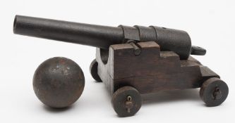 A cast iron model of a cannon:, the 11 inch four stage barrel with plain trunnions and touch hole,