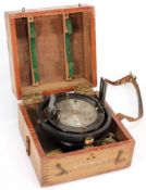 A lacquered brass sighting compass:,