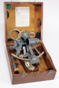 An Admiralty issue 8 inch radius vernier sextant by Hughes & Son London:,
