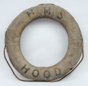 HMS Hood- an early 20th century grey canvas and rope life preserver:, black text to body 'HMS Hood',