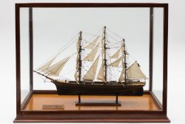 A scratch built model of the Cutty Sark: contained in a mahogany and glass panel case,