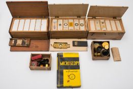 A collection of botanical and entomological microscope slides in three boxes,